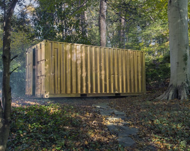 These gold-colored shipping containers open windows from one side of the world to another.