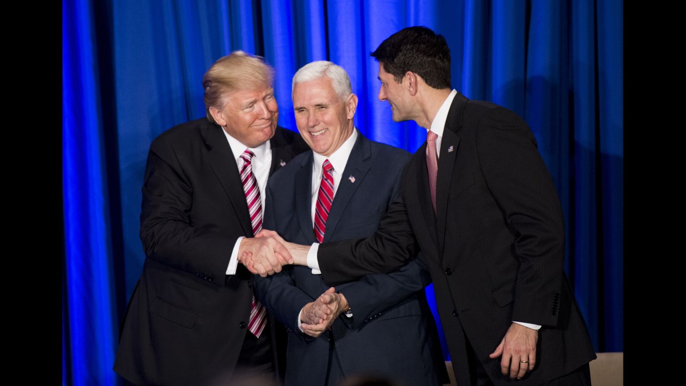 Trump and House Speaker Paul Ryan shake hands in front of Vice President Pence during a luncheon with GOP lawmakers on January 26. Trump <a href="http://www.cnn.com/2017/01/26/politics/donald-trump-hill-gop-retreat/" target="_blank">previewed an ambitious governing agenda</a> during his speech. "This Congress is going to be the busiest Congress we've had in decades, maybe ever," he said. "This is our chance to achieve great and lasting change for our beloved nation."
