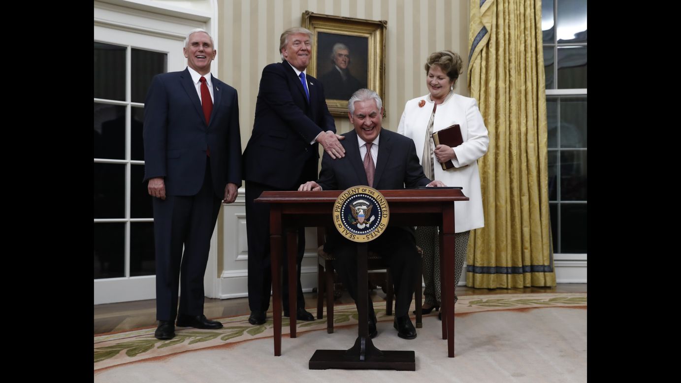 Trump puts his hand on the shoulder of Secretary of State Rex Tillerson after <a href="http://www.cnn.com/2017/02/01/politics/tillerson-confirmation-vote-senate/" target="_blank">Tillerson was sworn in</a> on February 1. They are joined by Vice President Pence and Tillerson's wife, Renda St. Clair. Tillerson, a former CEO of ExxonMobil, was <a href="http://www.cnn.com/2017/02/01/politics/tillerson-confirmation-vote-senate/" target="_blank">confirmed in the Senate </a>by a vote of 56 to 43.