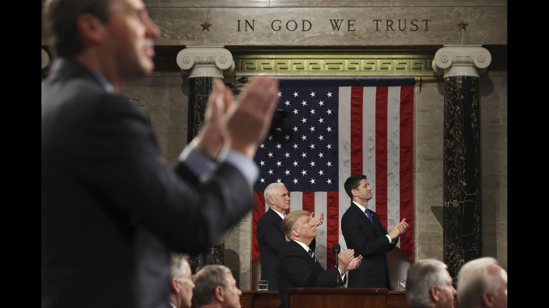 Trump applauds Carryn Owens during his speech to a joint session of Congress on Tuesday, February 28. Owens' husband, Navy SEAL William "Ryan" Owens, was killed during a recent mission in Yemen. "Ryan died as he lived: a warrior and a hero, battling against terrorism and securing our nation," Trump said. The <a href="http://www.cnn.com/2017/02/28/politics/navy-seal-widow-trump-address/" target="_blank">applause in the chamber</a> lasted over a minute, which Trump said must be a record.