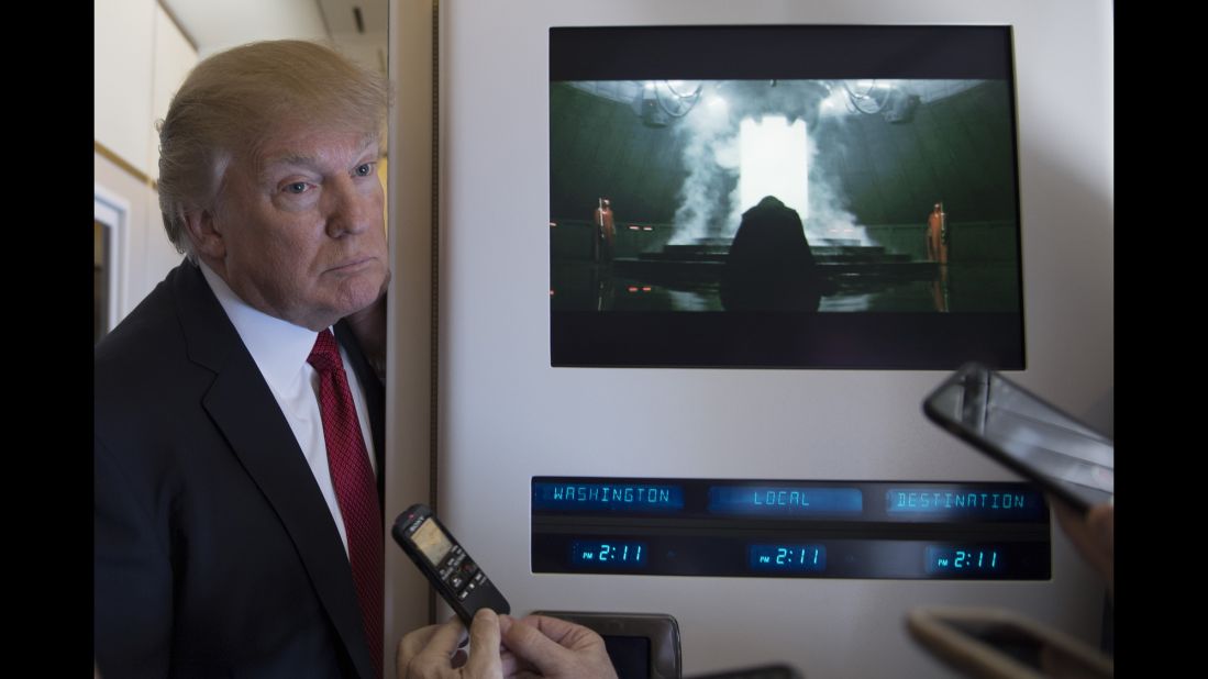 Trump speaks to the press aboard Air Force One on April 6. The Internet <a href="http://www.avclub.com/article/trump-stands-next-darth-vader-provoking-brief-mome-253358" target="_blank" target="_blank">had some fun with the juxtaposition</a> of Trump and "Star Wars" villain Darth Vader, who appeared in the scene on the right from the film "Rogue One."