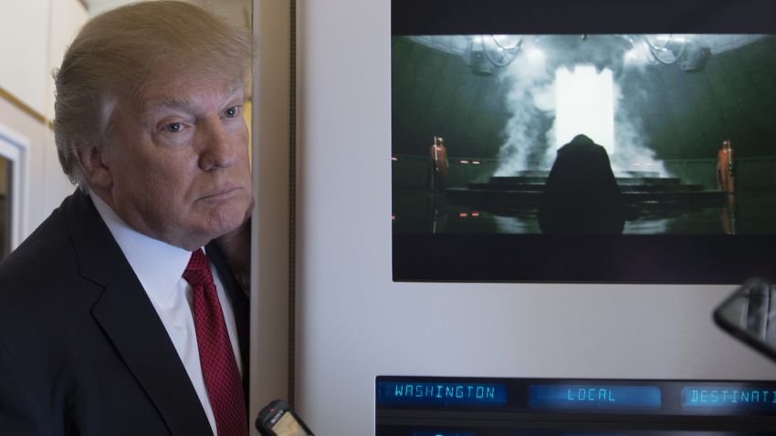 US President Donald Trump speaks to the press on Air Force One on April 6, 2017.
Chinese President Xi Jinping touched down in Florida Thursday for a first face-to-face meeting with President Donald Trump, hoping that a basket full of "tweetable" deals will help avoid a public clash.Trump had yet to arrive to Florida, but the pair will gather later at his Mar-a-Lago resort -- which the US president likes to call the "Winter White House" -- for what promises to be a masterclass in studied informality. / AFP PHOTO / JIM WATSON        (Photo credit should read JIM WATSON/AFP/Getty Images)