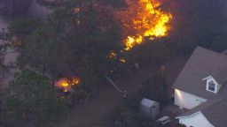 An aerial view shows another wildfire in Polk County.