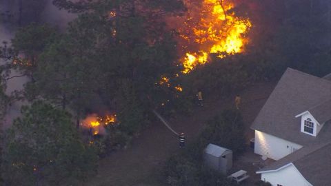 An aerial view shows another wildfire in Polk County.