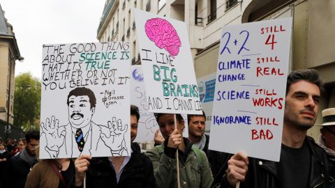 Marchers at the Paris March for Science holding signs. In addition to Paris and Berlin, marches were schedued in Rio, Munich, San Francisco, Boston, Oklahoma City and Bratislava, Slovakia.