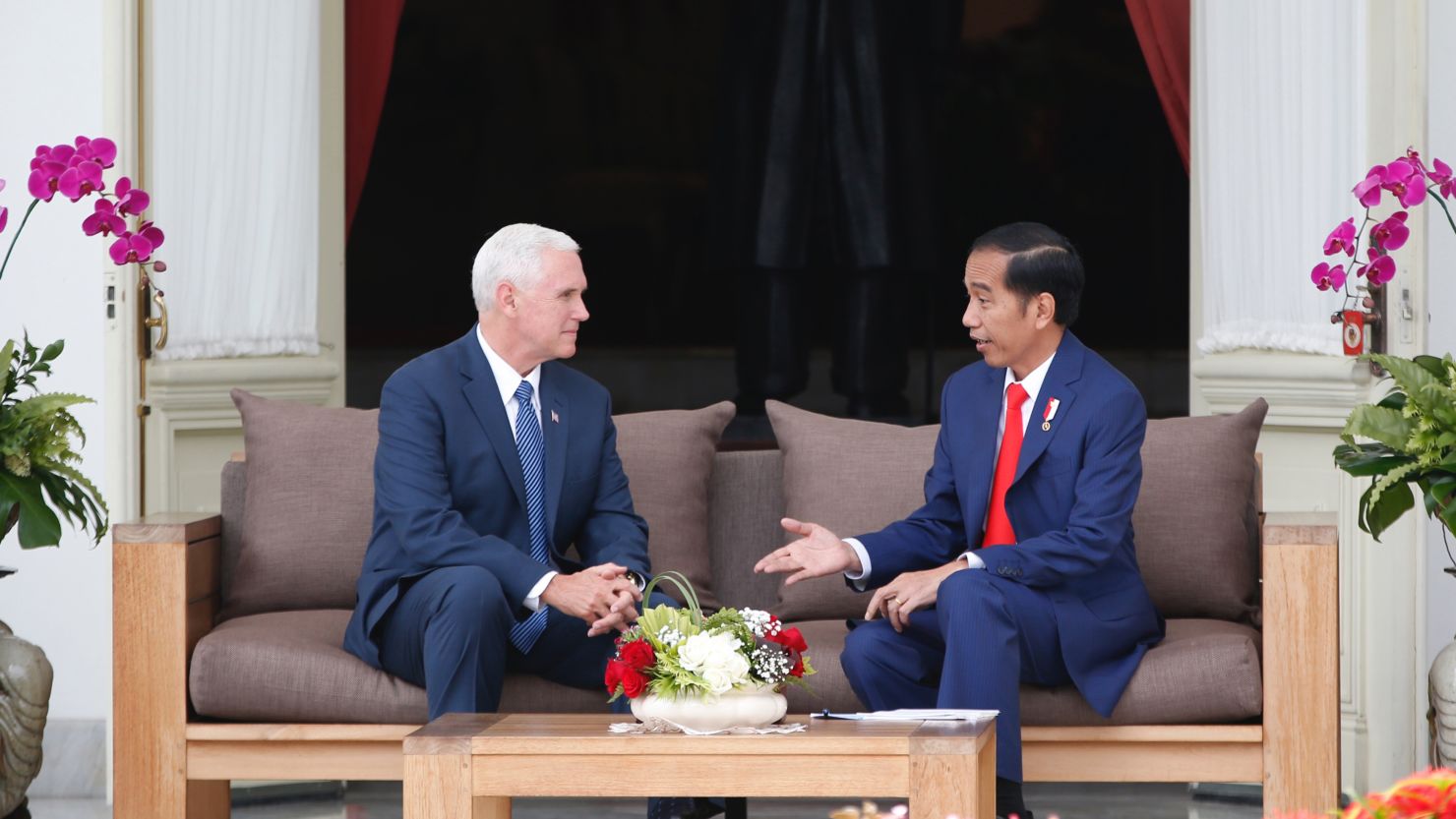 US Vice President Mike Pence (L) listens to Indonesian President Joko Widodo at Merdeka Palace in Jakarta on April 20.