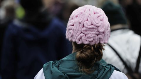 A woman wears a brain beanie during the March for Science in Portland. 