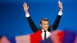 French centrist presidential candidate Emmanuel Macron waves before addressing his supporters at his election day headquarters in Paris , Sunday April 23, 2017. Macron and far-right populist Marine Le Pen advanced Sunday to a runoff in France's presidential election, remaking the country's political system and setting up a showdown over its participation in the European Union. (AP Photo/Christophe Ena)