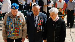 World War II veterans lay a wreath during a ceremony marking the annual Holocaust Remembrance Day at the Yad Vashem Holocaust Memorial in Jerusalem on April 24, 2017.
Israelis stood silent and sirens rang out for two minutes as the country held its annual remembrance of the six million Jewish victims of the Holocaust. / AFP PHOTO / POOL / AMIR COHEN        (Photo credit should read AMIR COHEN/AFP/Getty Images)