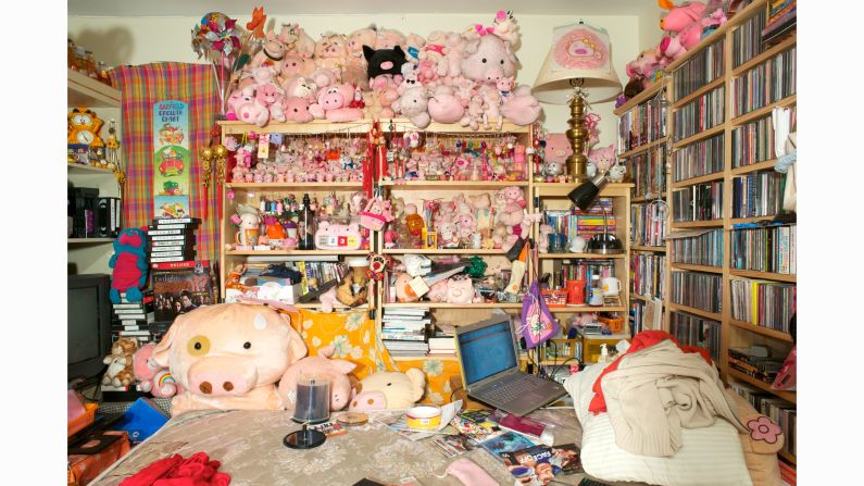 Louis Chan's life-size interior photographs of residents of New York City's Chinatown -- now showing in an exhibition called "At Home" -- burst with intimate detail.