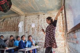 Ellen Stewart, a Conscious Impact volunteer, teaches 7th graders about environmental awareness at the Nawalpur Secondary School.