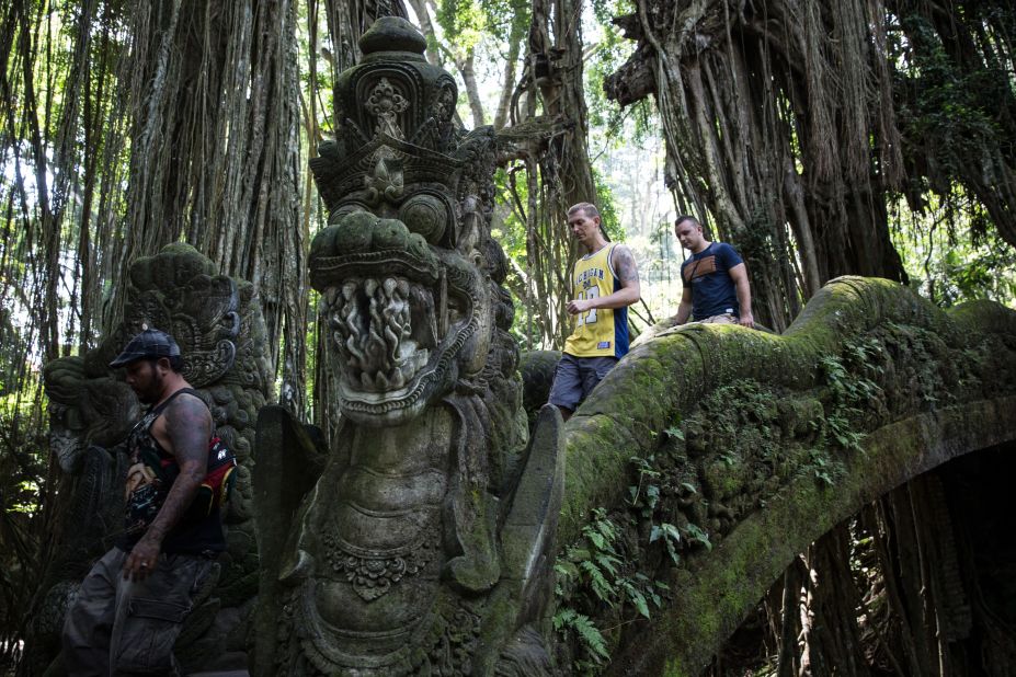 <strong>Monkey around: </strong>The Sacred Monkey Forest Sanctuary -- an Indiana Jones wonderland of dangling creepers, mossy statues, teetering bridges and, yes, monkeys -- is Ubud's No. 1 tourist draw.
