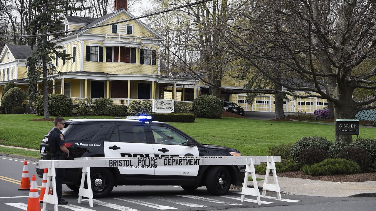 Police block the street for the funeral of Aaron Hernandez in Bristol, Connecticut, on Monday.