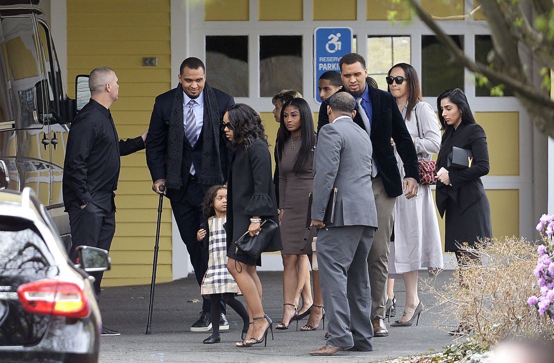 Shayanna Jenkins-Hernandez, fiancee of Aaron Hernandez, arrives with their daughter at funeral