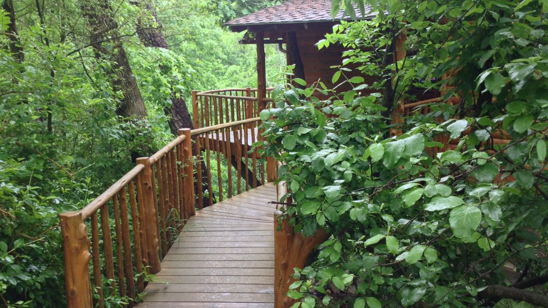 <strong>Treehouse Cottages, Eureka Springs, Arkansas:</strong> While three of these tree houses are located on a wooded hillside just minutes from downtown, four are actually within a 33-acre forest. (Jacuzzi included.)