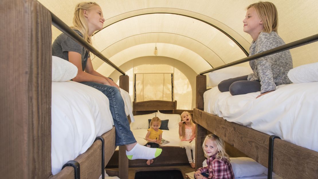 Sleep in a covered wagon at Conestoga Ranch.