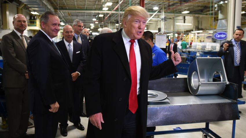 President-elect Donald Trump and Vice President-elect Governor Mike Pence(not seen) visit the Carrier air conditioning and heating company in Indianapolis, Indiana on December 1, 2016. (Photo credit should read TIMOTHY A. CLARY/AFP/Getty Images)