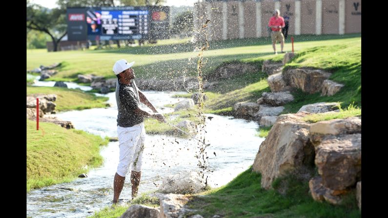 Tony Finau plays a shot out of a hazard during the Valero Texas Open on Friday, April 21.