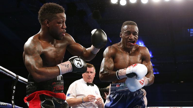Darryll Williams, left, punches Jahmaine Smyle during their super-middleweight bout in Leicester, England, on Saturday, April 22. Williams won a split decision to become the English champion.
