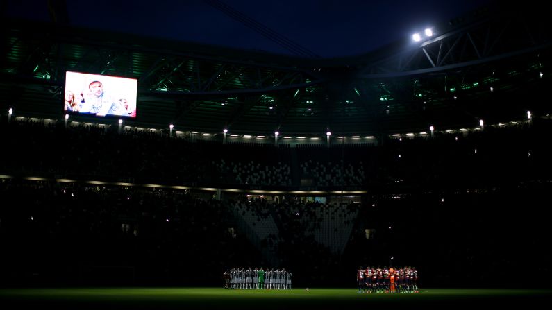 Soccer players from Juventus and Genoa observe a moment of silence for Michele Scarponi, the Italian cyclist <a target="_blank">who was killed</a> while training near his home in Filottrano, Italy, on Saturday, April 22. He was 37. <a target="_blank">See 24 amazing sports photos from last week</a>