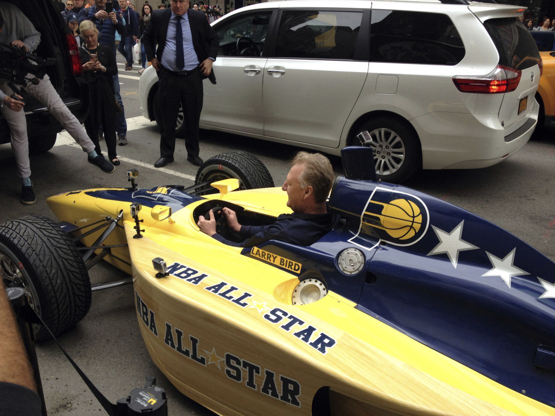 Bird somehow squeezed all 6 feet 9 inches of himself into a specially outfitted IndyCar on Monday.