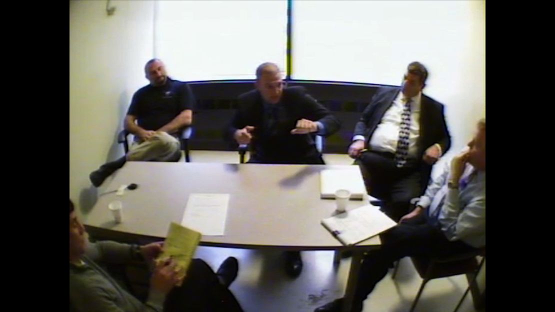 Cleveland Police officer Timothy Loehmann (center) explained to officials the events before, during, and after the shooting of Tamir Rice, 12, in 2014.