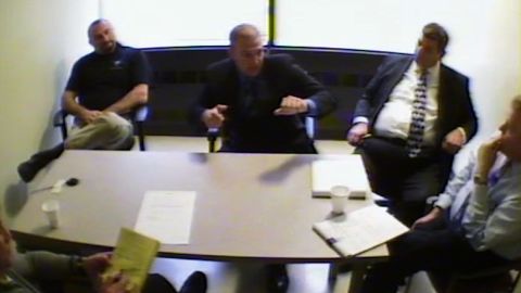 Cleveland Police officer Timothy Loehmann (center) explained to officials the events before, during, and after the shooting of Tamir Rice, 12, in 2014.