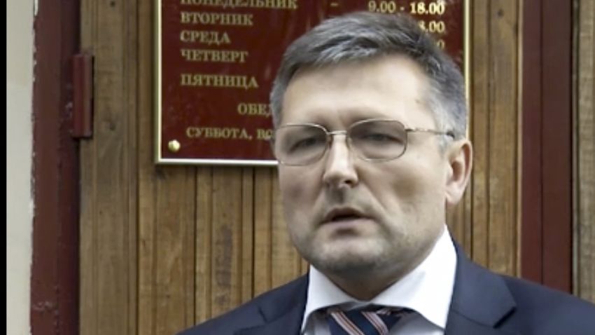 In this frame grab made from Sept. 13, 2012 AP video, lawyer Nikolai Govorkov leaves a court in Moscow, Russia. The lawyer hired by the family of Sergei Magnitsky, a Russian whistleblower who died in jail, has been injured in a fall from his Moscow apartment Tuesday, March 21, 2017. He is now in hospital with serious head injuries, according to a statement from William Browder, Magnitsky's former employer. (APTN photo via AP)