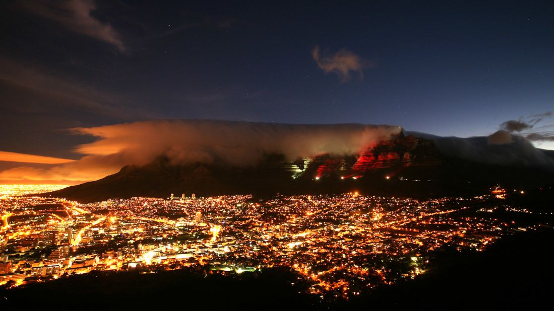 <strong>Table Mountain, Cape Town: </strong>While other cities have skyscrapers to be lit up for special occasions, Cape Town has Table Mountain. The flat-topped mountain is arguably the most iconic and beloved landmark in the city. 