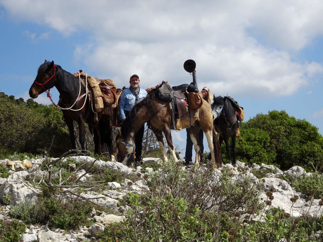 Four riders are trekking from Athens to Kassel, Germany as part of an art piece titled "The Transit of Hermes." 
