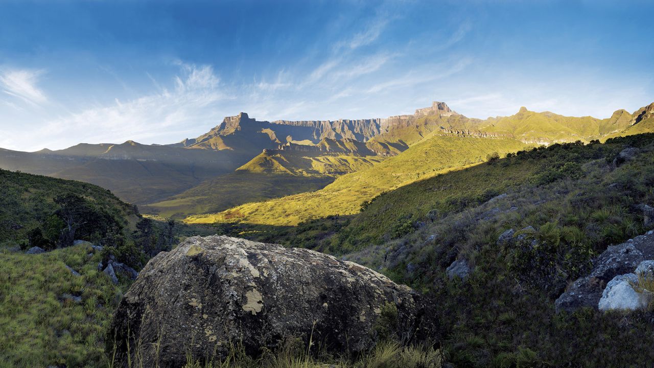 <strong>Amphitheatre, Drakensberg, Kwa-Zulu Natal: </strong>Amphiteatre is a near perfect symmetrical rock wall rising 1,200 meters from the Tugela Valley. The most notable feature among Drakensberg mountains, Amphitheatre offers challenging hiking trails for experienced hikers.