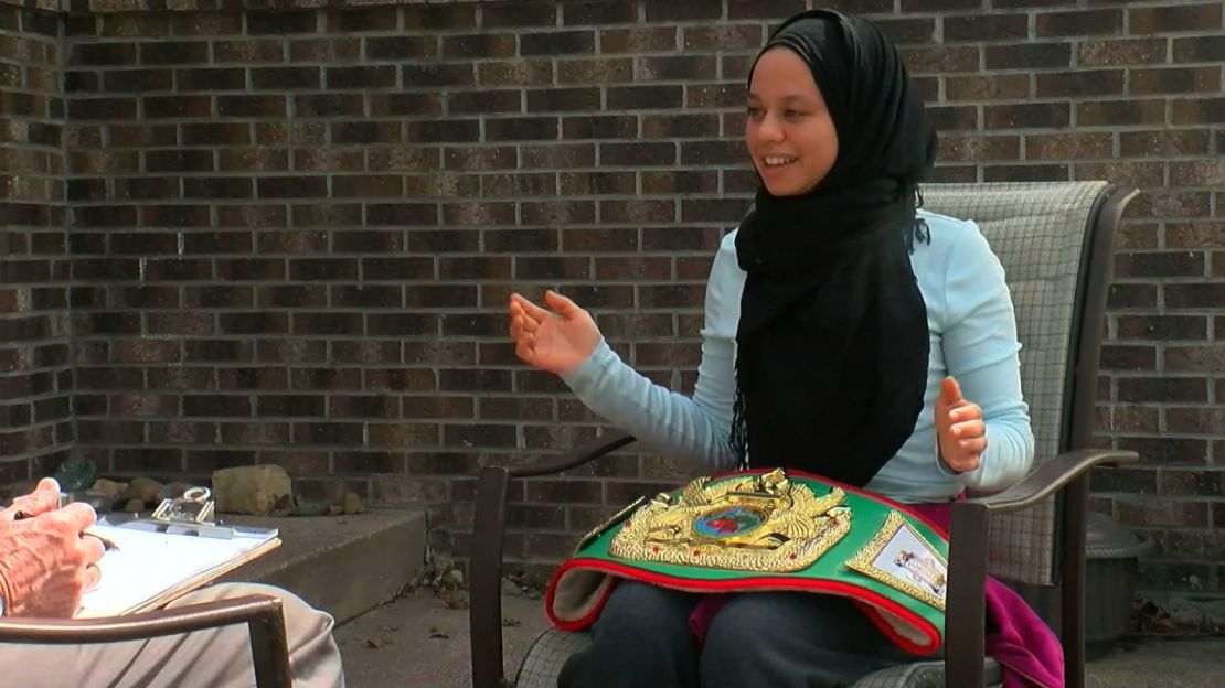 When Zafar was disqualified in November, her opponent, Aliyah Charbonier, gave her this title belt.