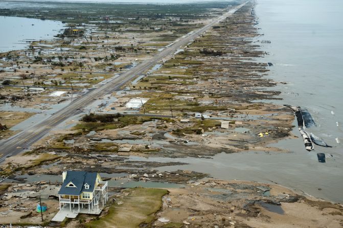 A single home is left standing amid debris from Hurricane Ike on September 14, 2008, in Gilchrist, Texas. 