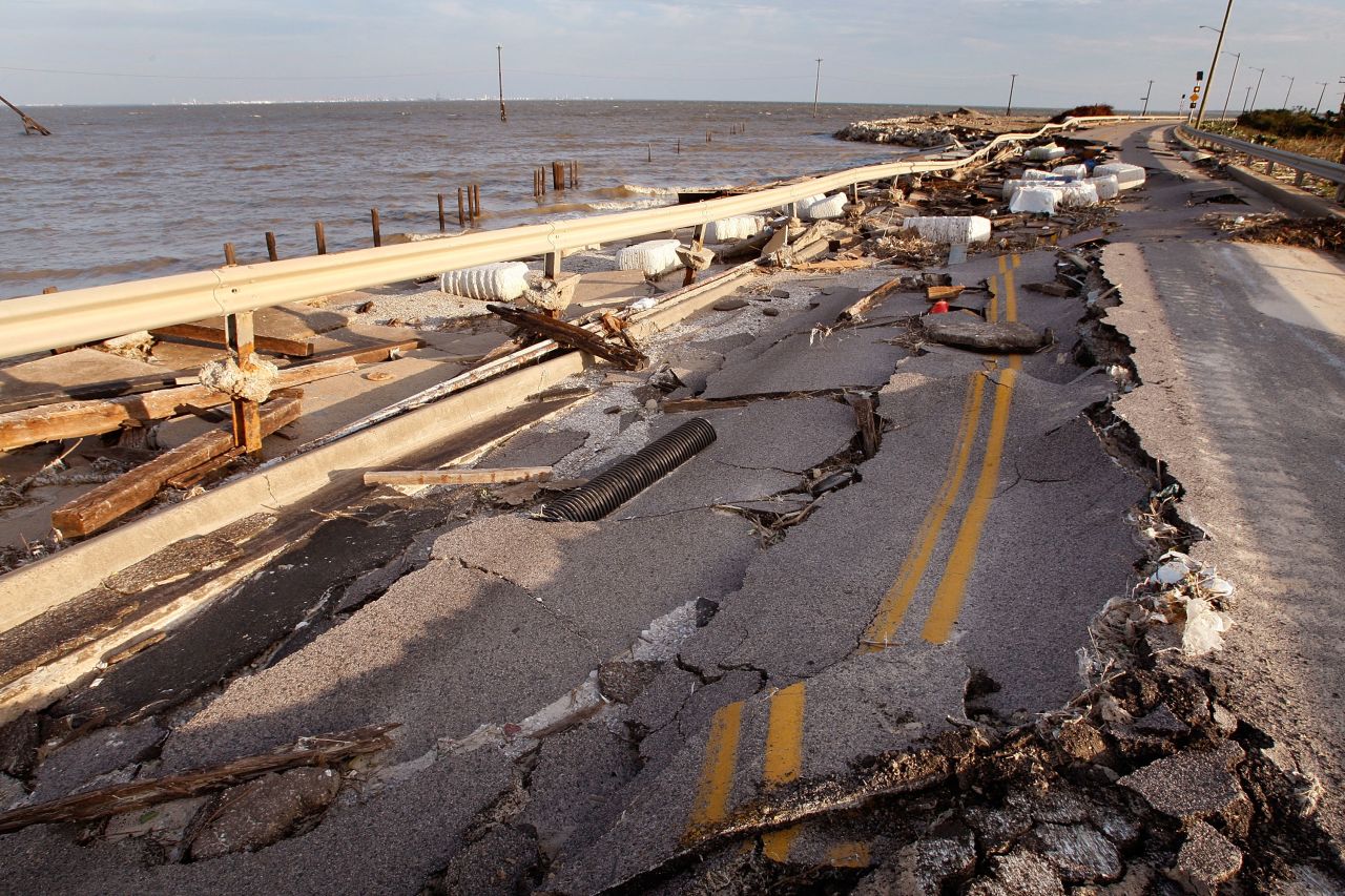A collapsed road sits in disrepair on September 15, 2008, in Galveston, Texas, following Hurricane Ike.
