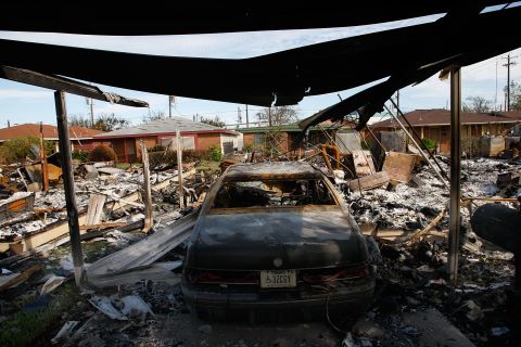 A car sits in a burned-out garage on September 16, 2008, in Galveston, Texas, the result of one of many fires sparked by Hurricane Ike.