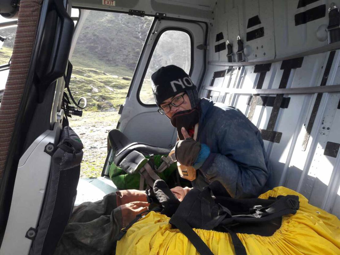 Survivor Liang Sheng-yue was found conscious and with the remains of his partner, Liu Chen-chun, just before midday Wednesday and airlifted out of a ravine near the Narchet River in the Himalayas.