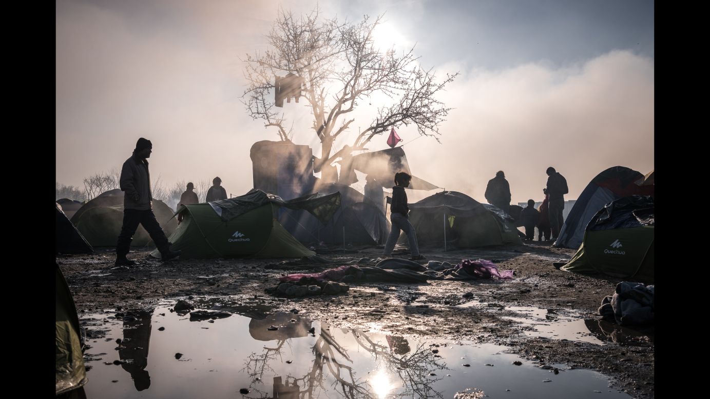 Refugees and migrants, who were refused entry to Macedonia, camp in harsh winter conditions near the closed border crossing. (March 11, 2016)