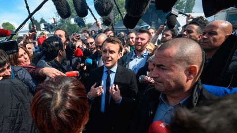 Macron was jeered when he first arrived at the factory.