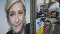 Campaign posters of French presidential election candidates Marine Le Pen and Emmanuel Macron in the Le Pen stronghold of Henin-Beaumont, northern France.