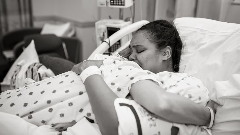 Kim hugs her surrogate Cydnee. " I was beyond grateful for her incredibly selfless act," Kim <a href="index.php?page=&url=http%3A%2F%2Fwww.kimjoverton.com%2Fa-miracle-through-surrogacy%2F" target="_blank" target="_blank">recalls</a> of this moment, "and relieved that the long haul was finally over."