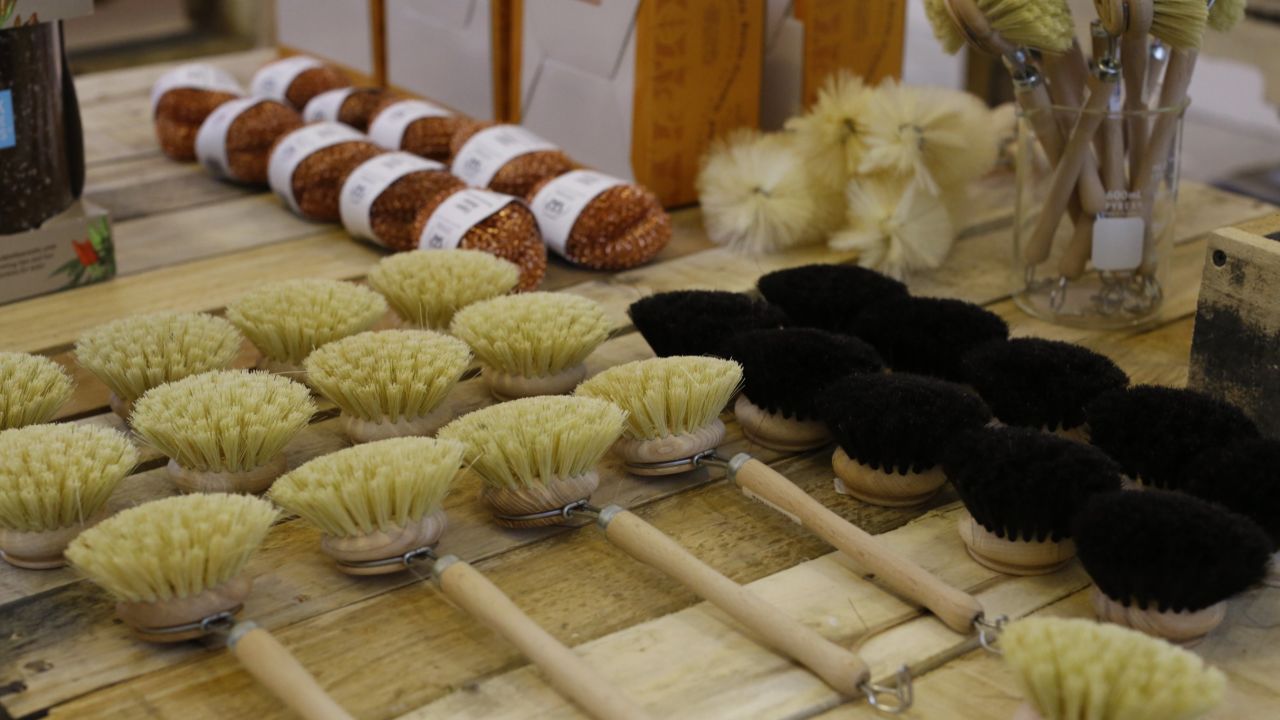 Brushes with little or no packaging sit on a shelf at Package Free in New York.