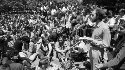 Mario Savio, right, speaks at a "Peoples Park" free-speech rally at UC Berkeley in June 1969.