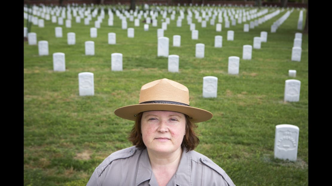 Elizabeth Dinger is the lead park ranger at Poplar Grove National Cemetery in Dinwiddie County, Virginia. "These men died fighting for their country ... putting this right is the last nice thing we can do for these soldiers," she said. 