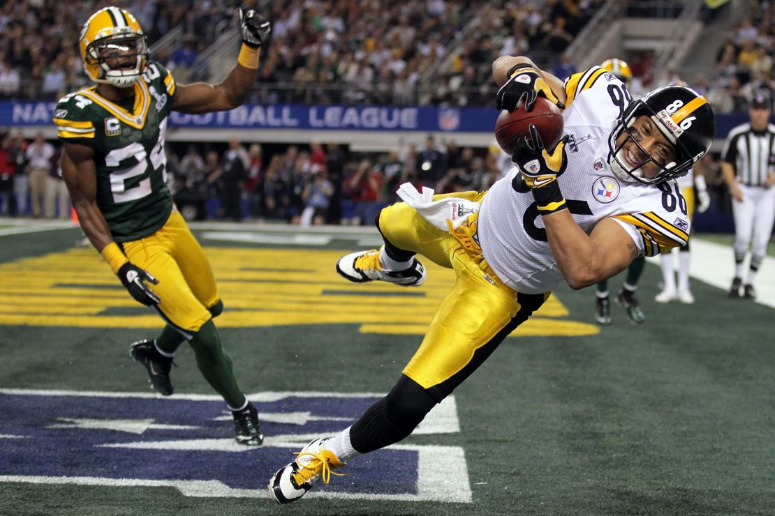 Hines Ward of the Pittsburgh Steelers catches an eight-yard touchdown pass in Super Bowl XLV.