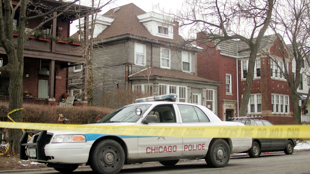 In this March 1, 2005, file photo, a Chicago Police car is parked in front of the home of District Judge Joan Lefkow in Chicago, where her husband and mother, Michael Lefkow and Donna Humphrey, were found murdered.