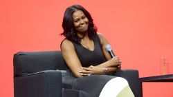 Former United States first lady Michelle Obama smiles during the AIA Conference on Architecture 2017 on April 27, 2017 in Orlando, Florida.
