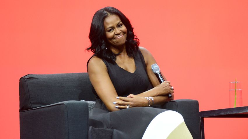Former United States first lady Michelle Obama smiles during the AIA Conference on Architecture 2017 on April 27, 2017 in Orlando, Florida.