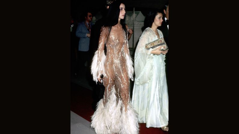 Cher attends "Romantic and Glamorous Hollywood Design" in 1974. 