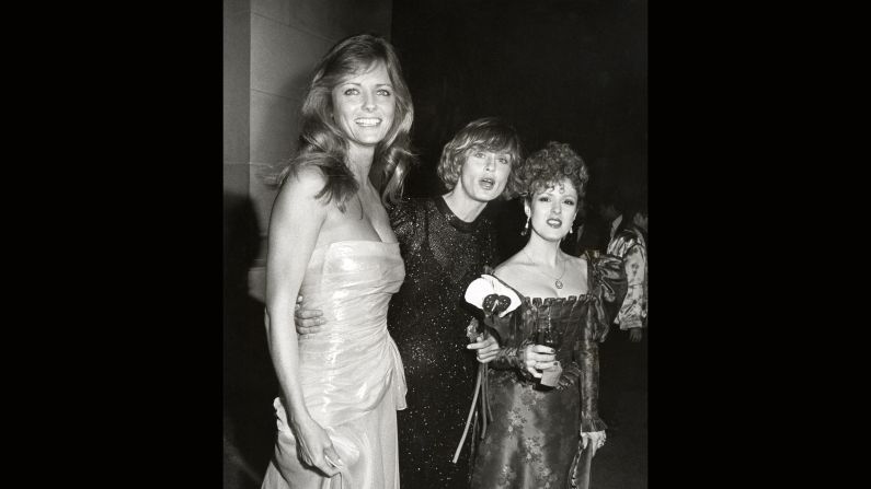 Models Cheryl Tiegs and Lauren Hutton attend the event in 1982 -- themed "La Belle Époque" -- with actress Bernadette Peters. 