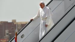 Pope Francis disembarks from his plane upon his arrival at Cairo's International airport on April 28, 2017, during an official visit to Egypt.
Pope Francis began a visit to Egypt to promote "unity and fraternity" among Muslims and the embattled Christian minority that has suffered a series of jihadist attacks. / AFP PHOTO / Andreas SOLARO        (Photo credit should read ANDREAS SOLARO/AFP/Getty Images)